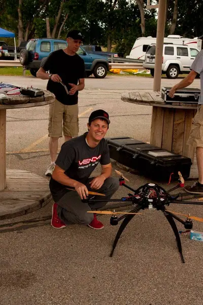 Brandon R readies his octa-copter for the flag raising.
