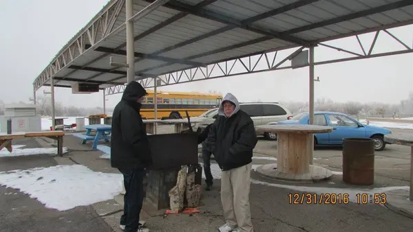 Dan and Frank keeping warm.